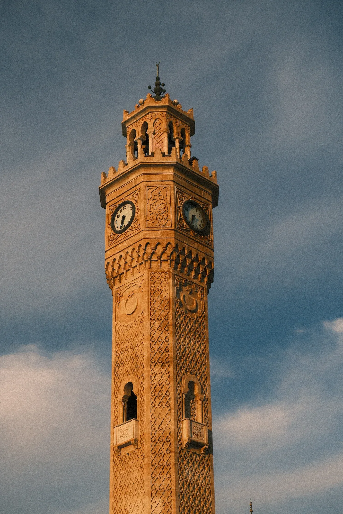The ornate Izmir Clock Tower glowing in the evening sun